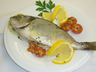 Ricetta Orata al forno con patate e pomodorini ciliegia